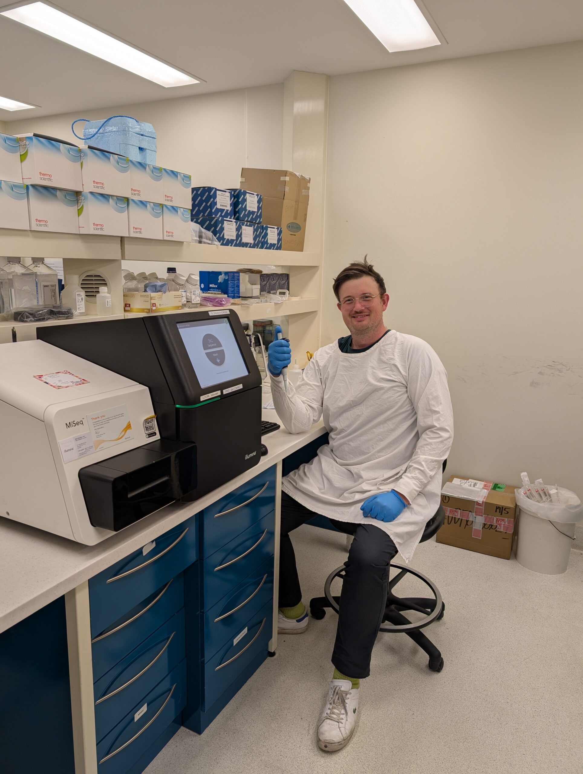 The virus that won’t quit: New research reveals how SARS-CoV-2 evolves 1 A man sits in a laboratory smiling.
