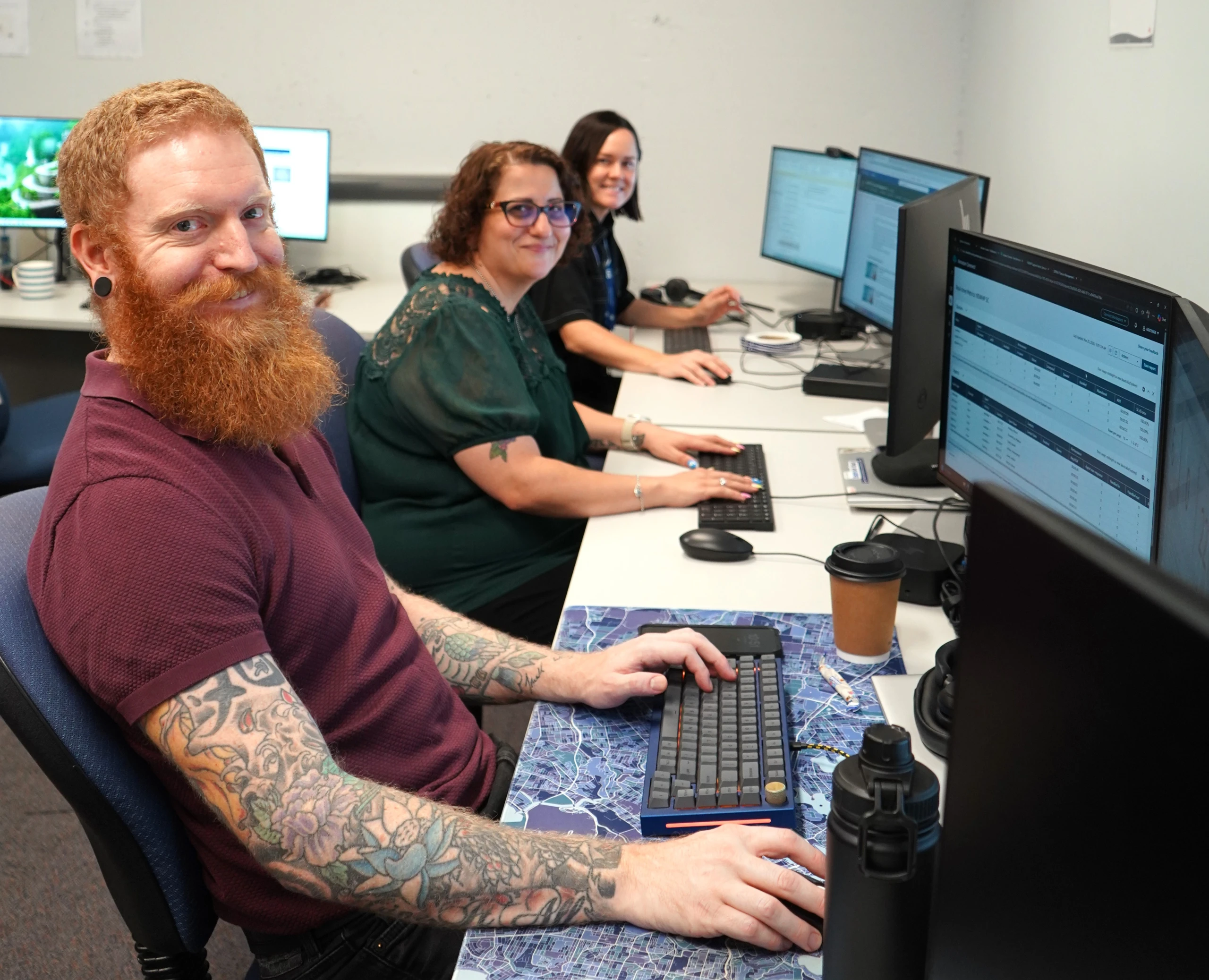 A group of people working on computers