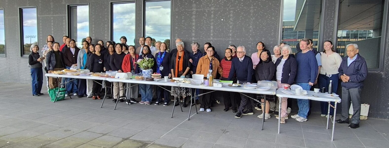 Celebrating Dr Robyn Hardiman’s dedication to discovery, diagnosis and care for over forty years! 1 Lots of people standing in front of a cake table